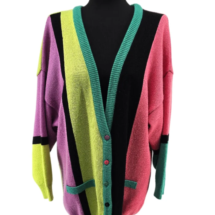 Vintage sweater with bold 80s colorblock design displayed on a mannequin