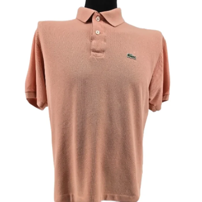 Front view of vintage Lacoste polo shirt in peach cotton with embroidered crocodile logo