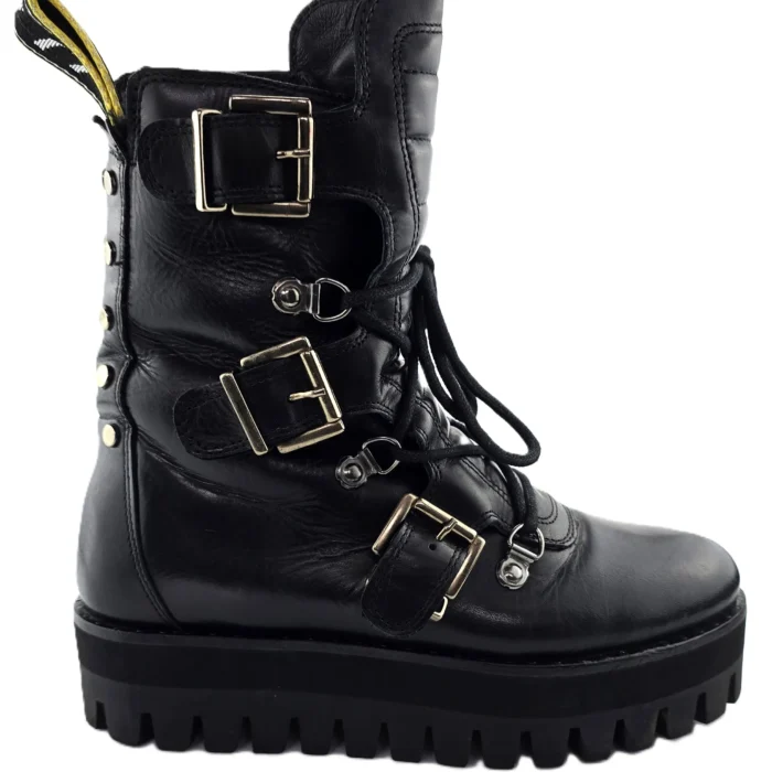 Side view of black leather Vintage Ladies Boots Buffalo with chunky sole and metal buckles.