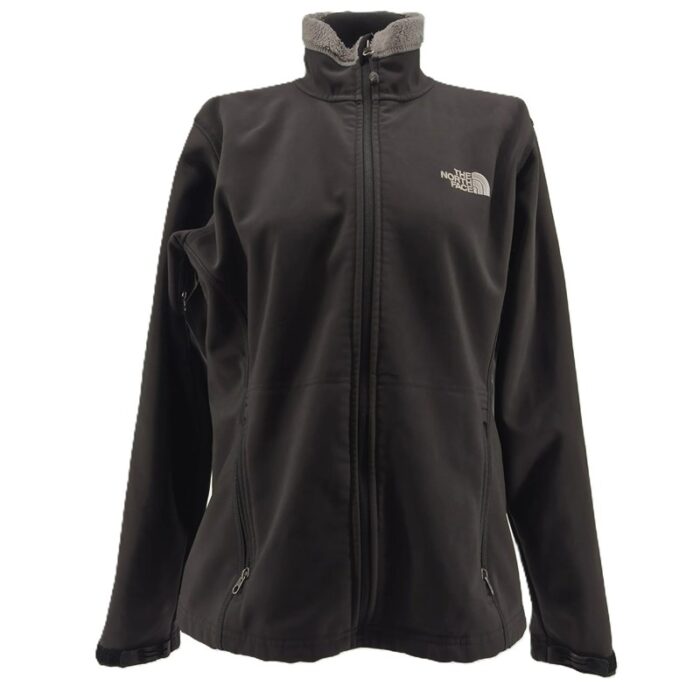 Front view of black The North Face Summit Series vintage jacket for men with fleece lining.