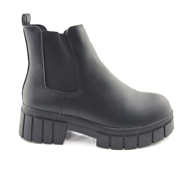 alt="Black chunky vintage boots for women on white background"